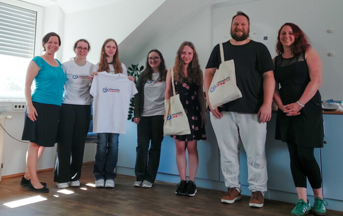 Ein Gruppenfoto aller anwesenden Personen.