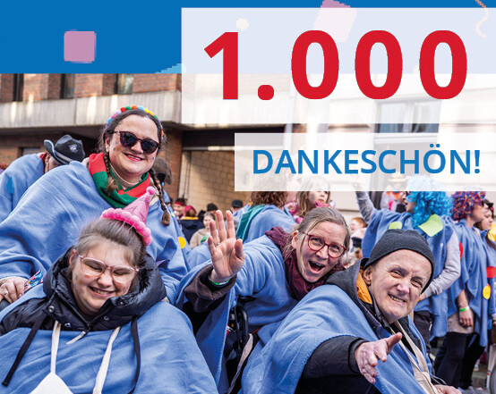 Text "Über 1000" und "Dankeschön" vor einem Gruppenbild.